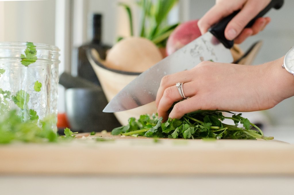 woman preparing meal for dinner for her family 