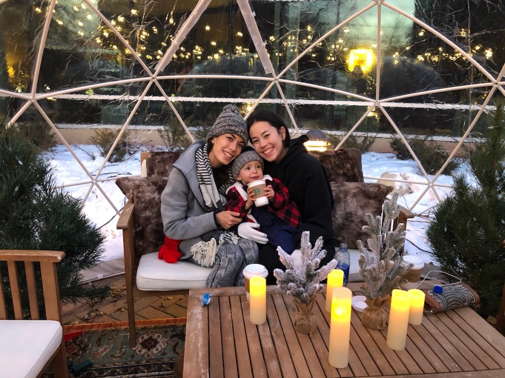 toddler happy in igloo in Minnesota