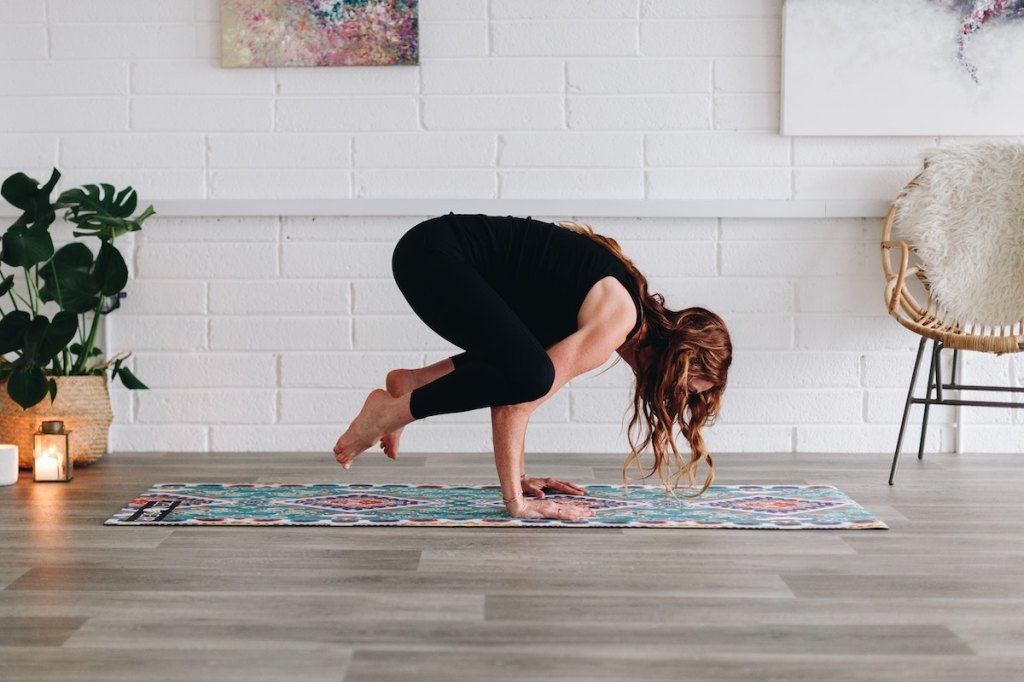 mom doing yoga as her exercise routine